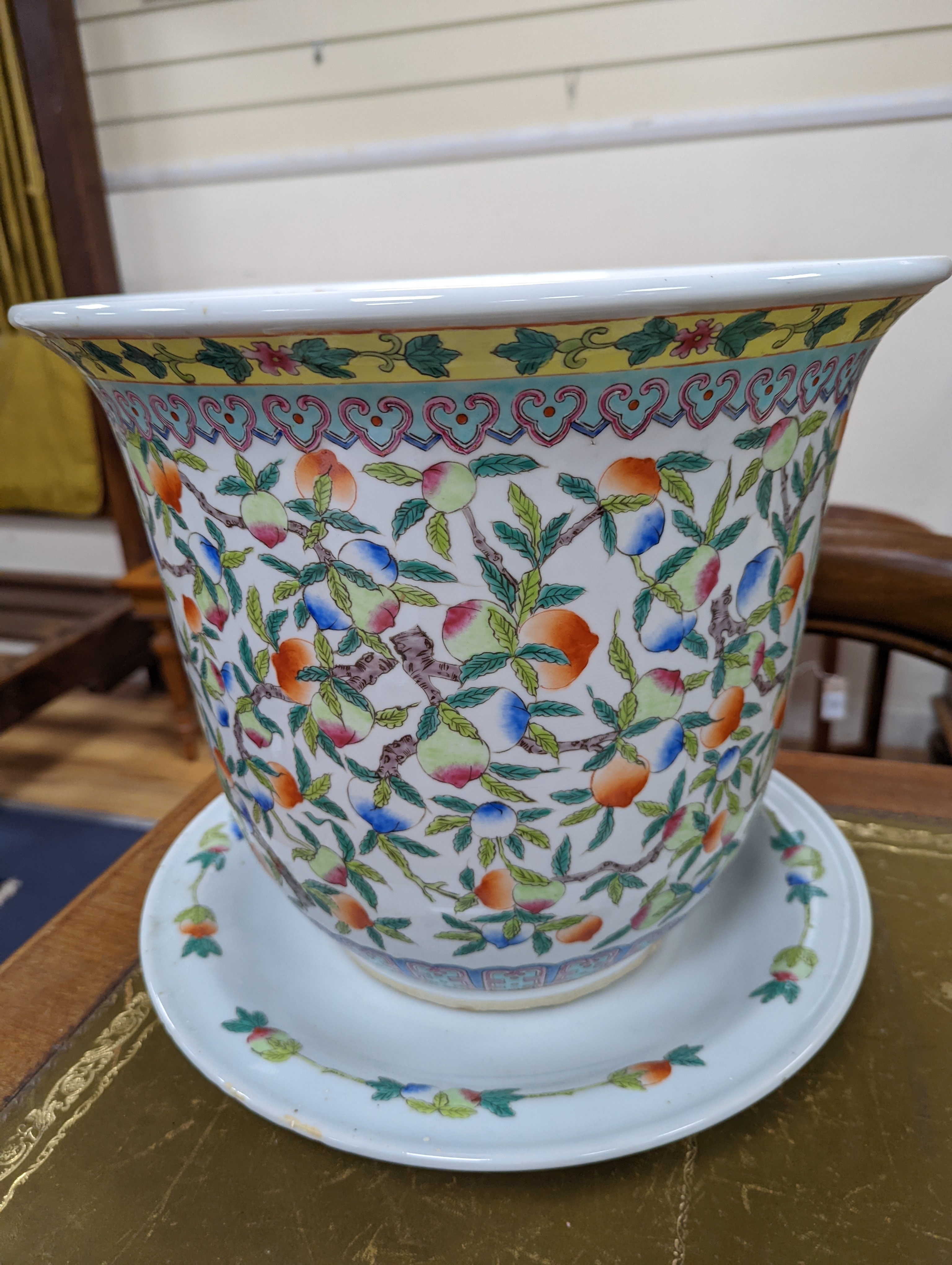 A 20th century Chinese porcelain jardiniere and dish, diameter 36 cms.